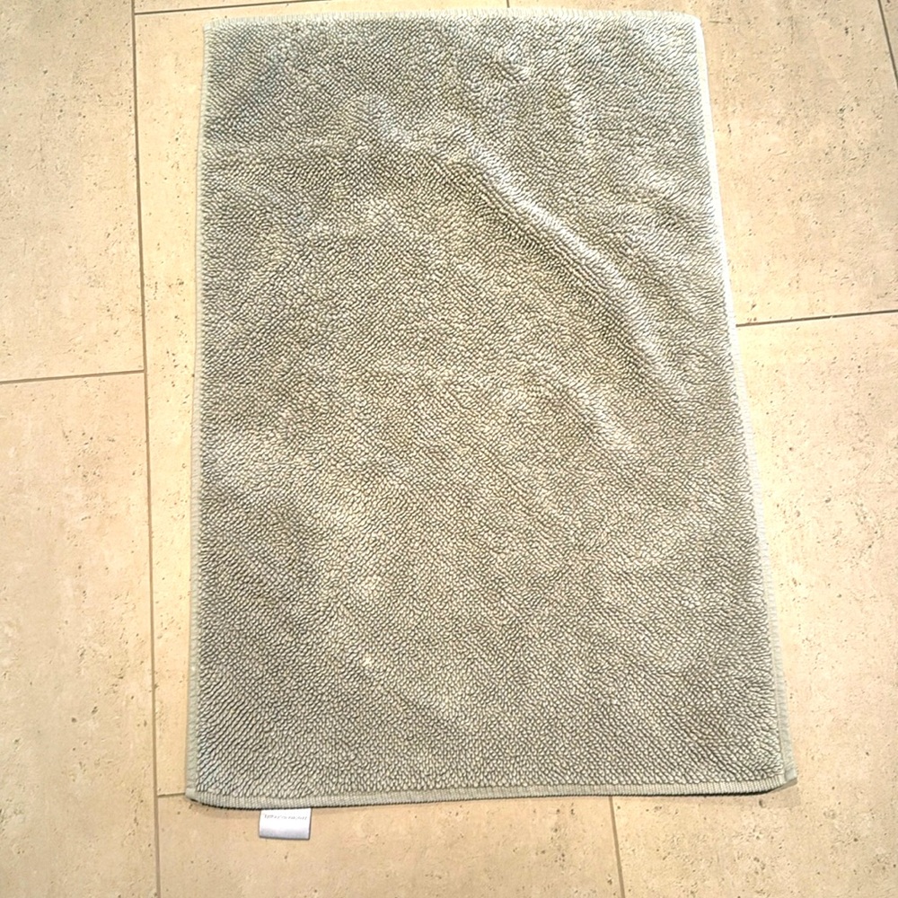 Restoration Hardware bath mat. Gently used. Has one small faded spot.